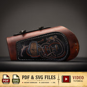 a leather sleeve with a detailed design, including a dragon and a skull, which appears to be a custom-made item.